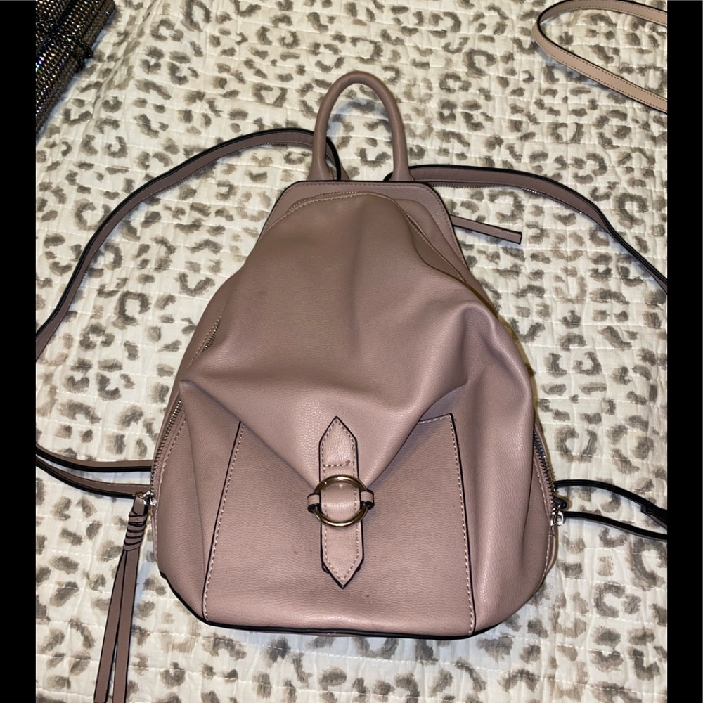 Clark’s book bag with adjustable zipper in back
